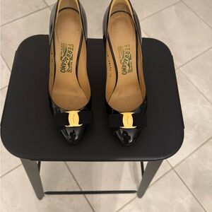 Salvatore Ferragamo Black Patent Leather Vara Bow Pumps with Gold Plaque